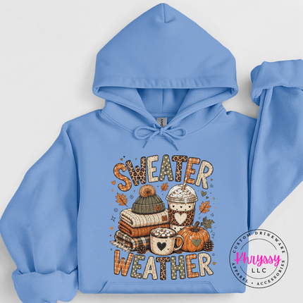 Carolina Blue hoodie printed with the autumn sweater weather graphic