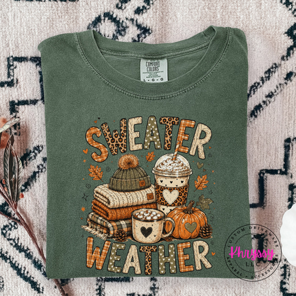 Moss tee styled with jeans showing the sweater weather fall graphic