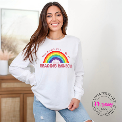 Solid white blend tee with a nostalgic book-lover rainbow design.