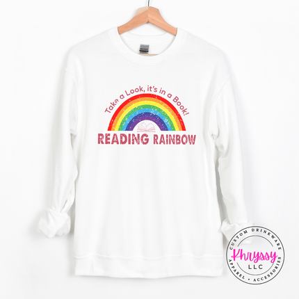 White heavyweight crewneck with a colorful rainbow book-lover graphic.