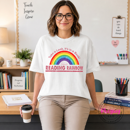 White cotton tee with a nostalgic Reading Rainbow literacy design.