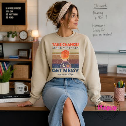 Sand crewneck showing a retro science-classroom messy design.