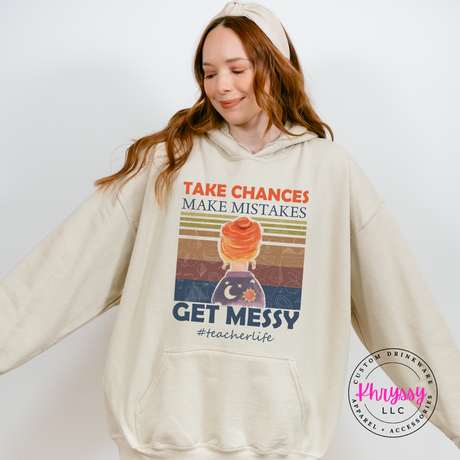 Sand hoodie showing a retro science-classroom messy design.
