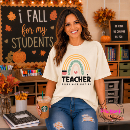 Soft boho rainbow teacher graphic shown on an Ivory colored tee.
