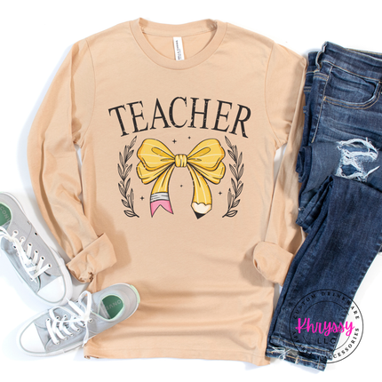 Teacher bow pencil tee in Sand Dune, styled for an easy everyday look.