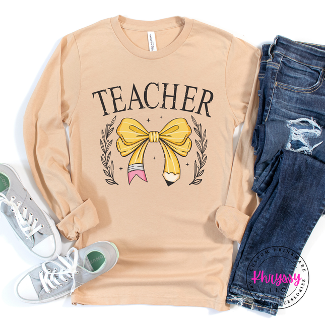 Teacher bow pencil tee in Sand Dune, styled for an easy everyday look.