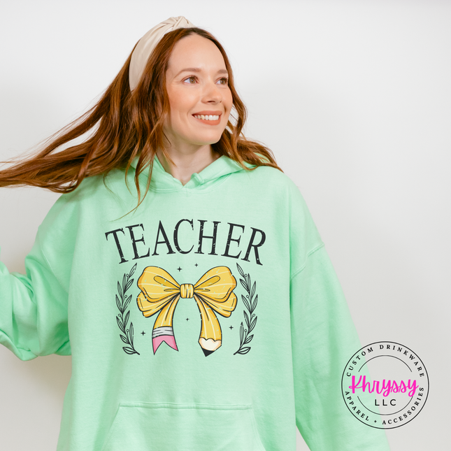 Elegant teacher graphic on a cozy Mint Green pullover hoodie.
