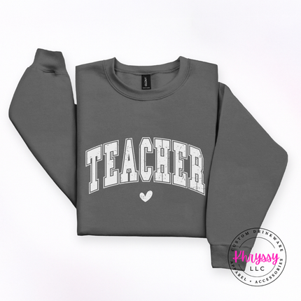 Teacher varsity crewneck sweatshirt in Charcoal, cozy for cool classroom mornings.