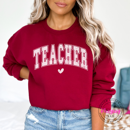 Close-up of arched teacher lettering and heart accent in Garnet.