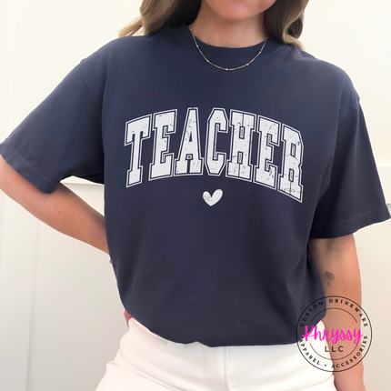 Distressed teacher varsity graphic on a soft Navy pigment-dyed t-shirt.