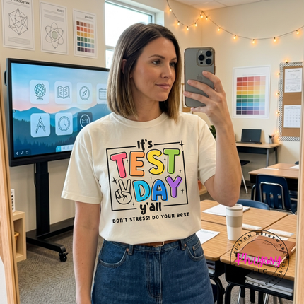 Colorful test day teacher shirt shown in Ivory, bright and encouraging.
