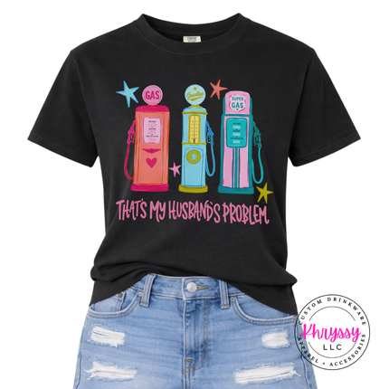 Black t-shirt with colorful gas pump design and text, paired with blue jeans.