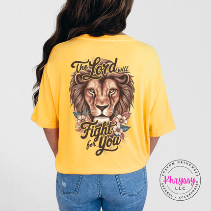 citrus garment-dyed tee featuring a lion and florals The Lord Will Fight back design.