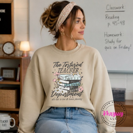 Sand crewneck showing all's fair in love and lesson planning.