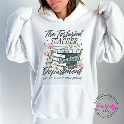 White cozy hoodie with a floral tortured-teacher book graphic.