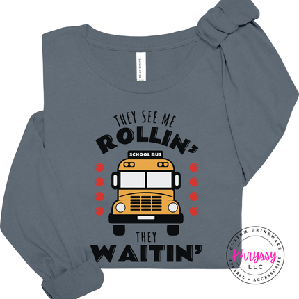 Steel Blue tee worn with jeans, highlighting the bus driver print.