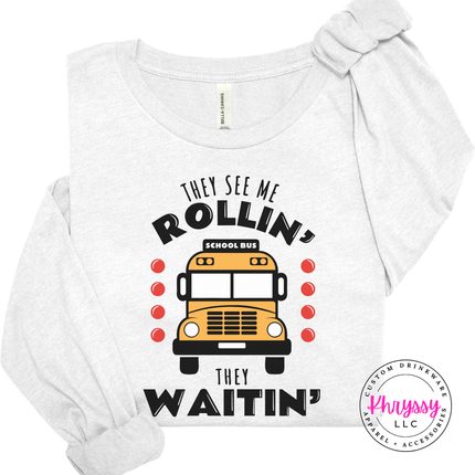 Ash tee with a funny school bus driver graphic.