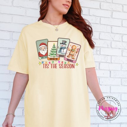 Woman wearing the Tis The Season Christmas card tee in Butter.