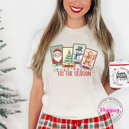 Woman wearing the Tis The Season Christmas card tee in Ivory.
