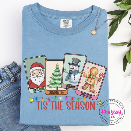 Santa, tree, snowman and gingerbread cards printed on an Ice Blue long sleeve tee.
