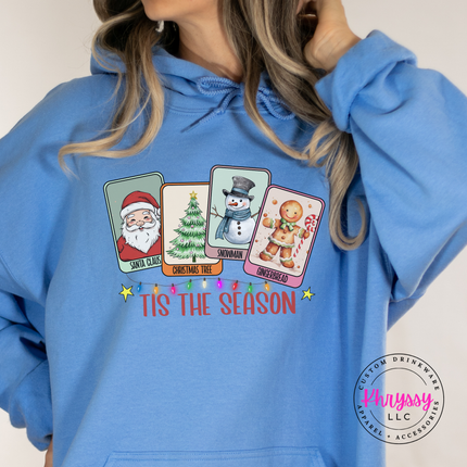 Santa, tree, snowman and gingerbread cards printed on a Carolina Blue hoodie.