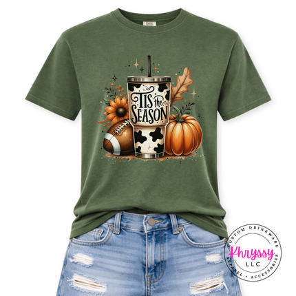 Moss colored graphic tee featuring a tumbler, football, and sunflower.