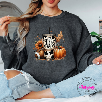 Dark Heather crewneck sweatshirt with the cow print tumbler football and pumpkin design