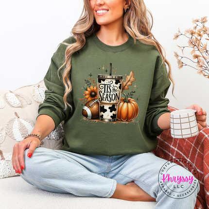 Woman wearing a Military Green crewneck sweatshirt with a tumbler design.
