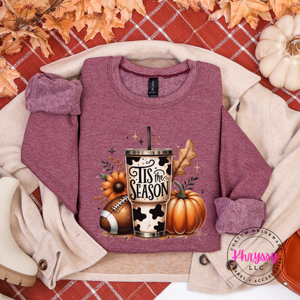 Heather Dark Maroon colored crewneck sweatshirt featuring a football and pumpkin collage.