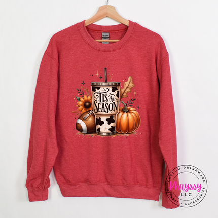 Heather scarlet red crewneck sweatshirt with a hand-illustrated Tis The Season print.
