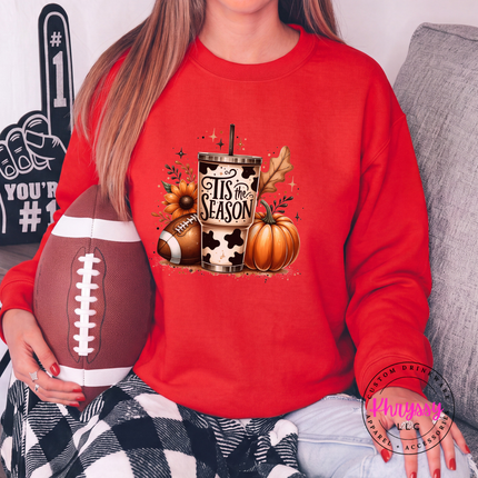 Red crewneck sweatshirt with the cow print tumbler football and pumpkin design
