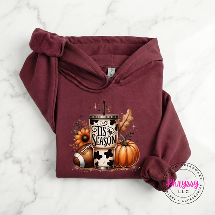 Maroon pullover hoodie with a tumbler design.