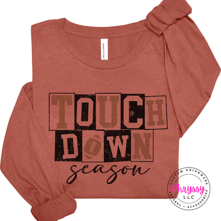 Heather clay tee with a retro touchdown season design.
