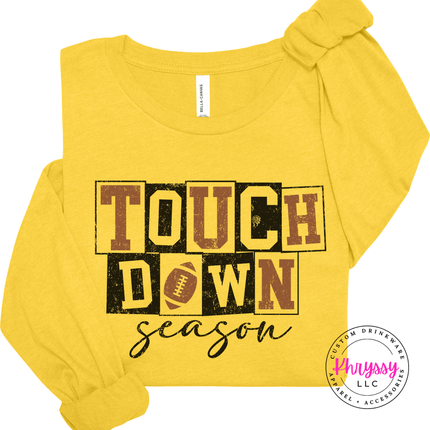 Heather Yellow Gold long sleeve tee with the football season block letter print