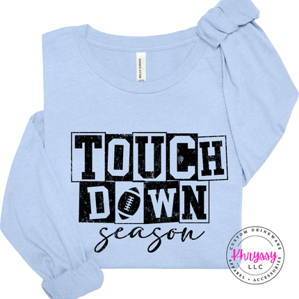 Baby Blue long sleeve tee with the distressed touchdown season football design