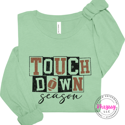 Mint long sleeve tee with the football season block letter print