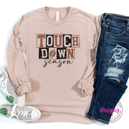 Heather Pink Gravel colored tee with a bold touchdown season illustration.