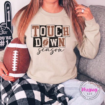Sand crewneck sweatshirt with the game day touchdown season script graphic