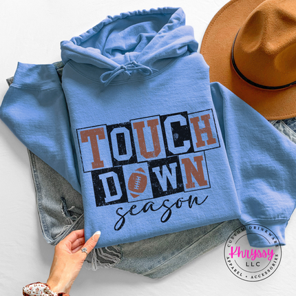 Carolina Blue hoodie with the distressed touchdown season football design
