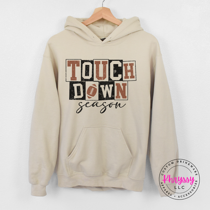 Sand colored hoodie featuring retro football block type design.