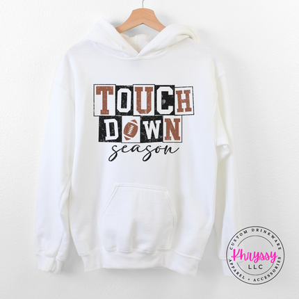 White pullover hoodie with a hand-illustrated touchdown season graphic.