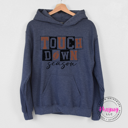 Heather sport dark navy pullover hoodie with a touchdown season design.
