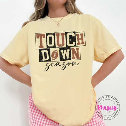 Butter tee with the distressed touchdown season football design