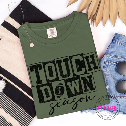 Woman wearing a Hemp tee with the game day touchdown season script graphic