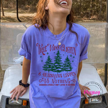 Close up of the funny wife Christmas art on a Violet tee.