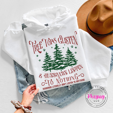 White hoodie showing pine trees with Husbands Listen To Nothing.