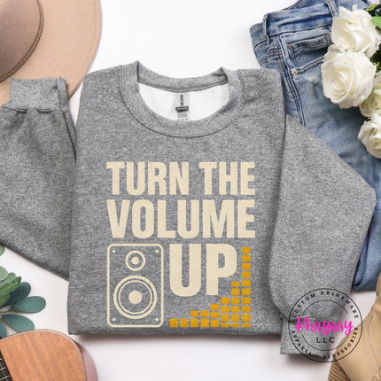 Thick warm bold statement crewneck with gold music volume lettering