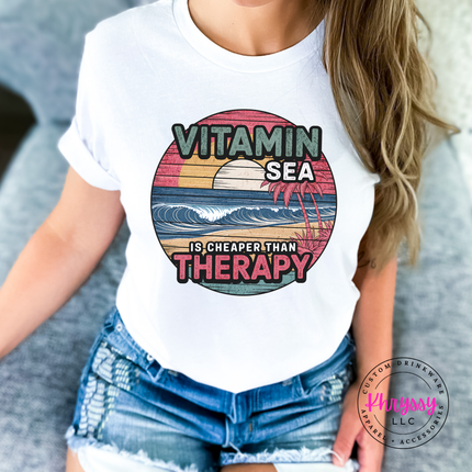 White Comfort Colors tee with a retro Vitamin Sea beach design.