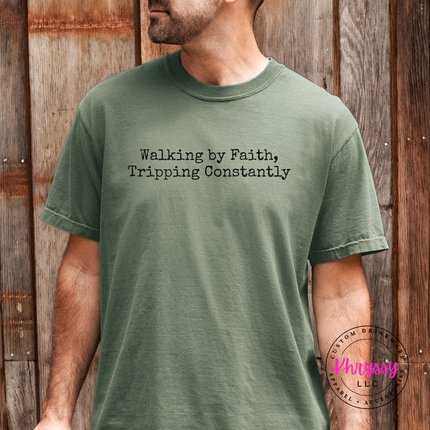 Woman wearing a Moss tee with the relatable walking by faith Christian graphic