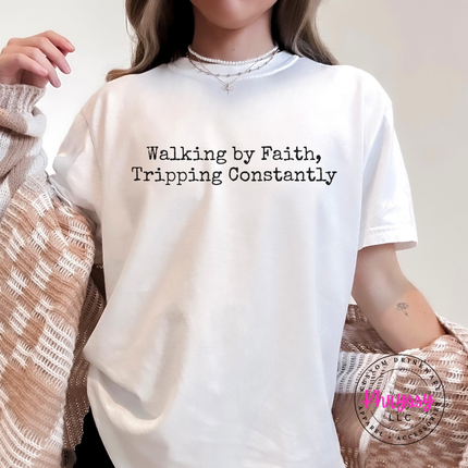 White tee with the relatable walking by faith Christian graphic